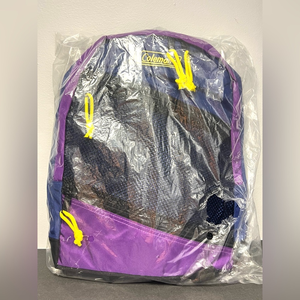 Coleman- Backpack, New in Bag, Around‎ 15.5 inches tall, Purple/Black/Yellow